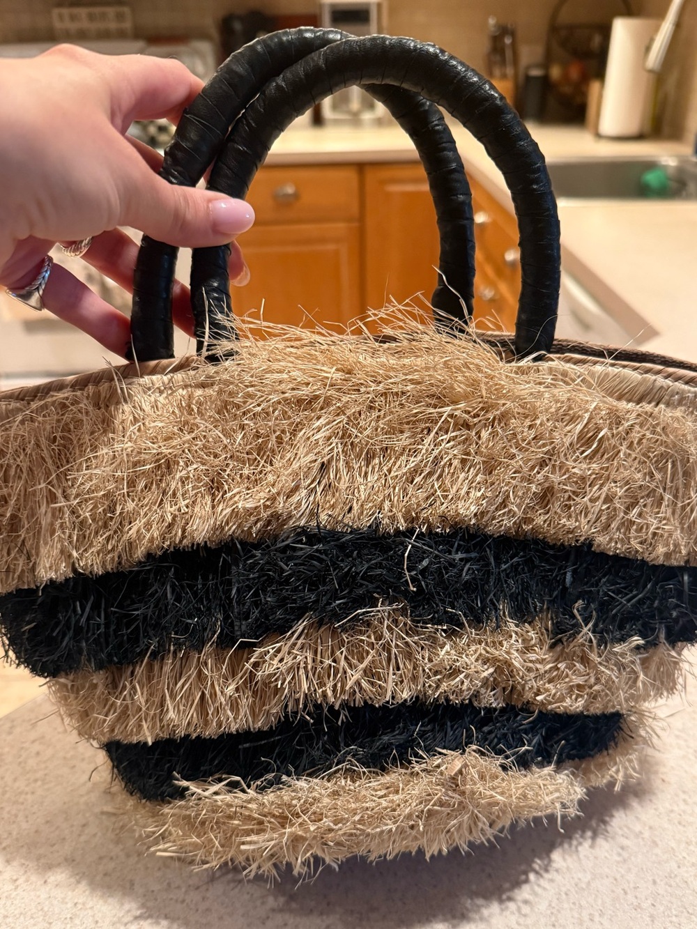 Kayu Piñata mini leather-trimmed fringed straw tote